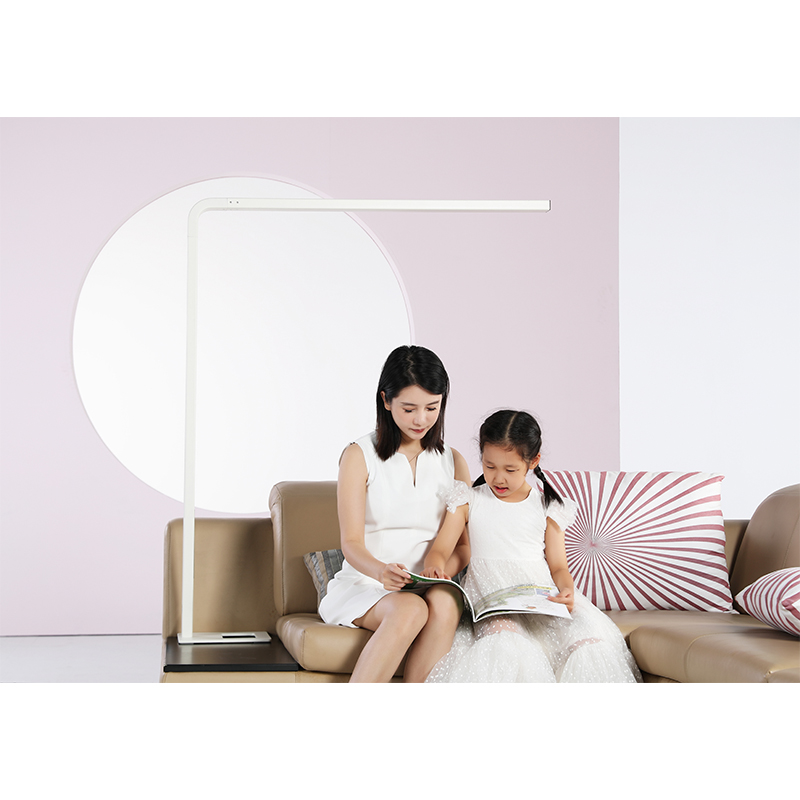 How can the spectral distribution of LED eye protection desk lamps be optimized to reduce blue light hazards?